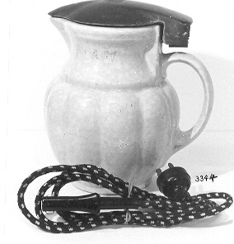Mottled earthenware jug;