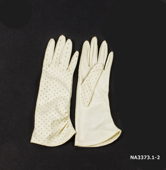 Cream coloured nylon gloves 