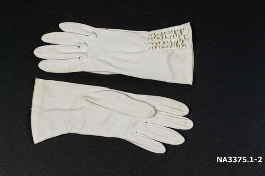 Cream nylon gloves; 