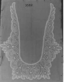 Black and White photograph of lace collar.