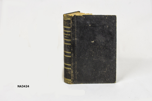 Black, bound hymn book with gilt lettering on spine.