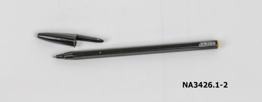 A black plastic biro and cap