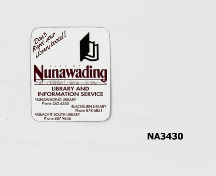 White plastic with brown printing of logo and 'Nunawading Library and Information Service'. 