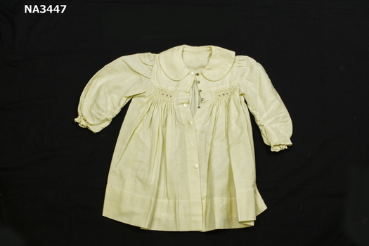 A cream viyella coat with Peter Pan collar, 