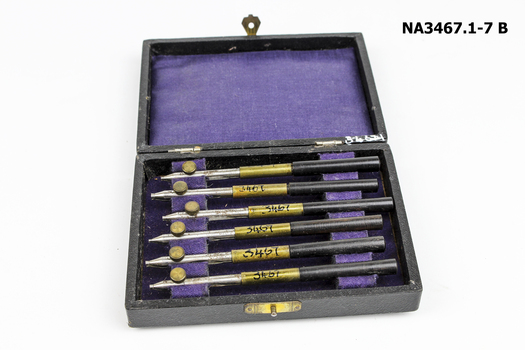 Six small needle nose pliers. 