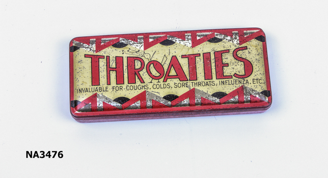 Red and gold oblong tin used for containing throat lozenges. 