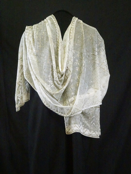 Cream cotton net, stamped with gold metallic thread into a Vandyke pattern