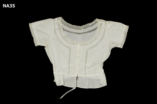 Cotton camisole with lace inserts. 