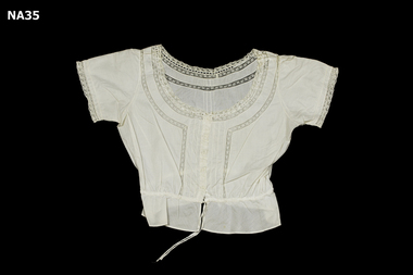 Cotton camisole with lace inserts. 