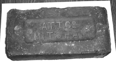 Clay brick with incised inscription