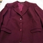 1980 Burgandy wool women's pleated skirt and three buttoned jacket. 
