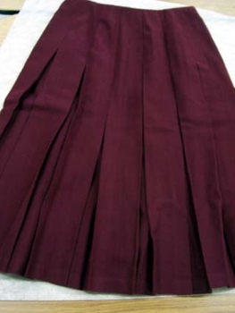 1980 Burgandy wool women's pleated skirt and three buttoned jacket. 