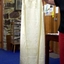 Cream sleeveless nightdress with round neckline. 