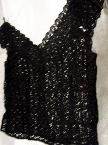 1970s Ladies black lace sleeveless top with v neckline back and front. 