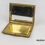 Oblong gilt case with pink enamel on lid.