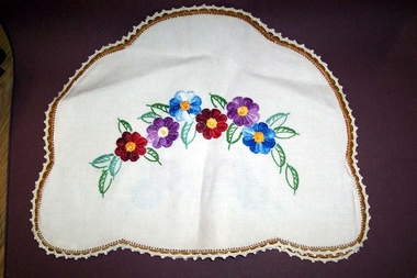 Oval shape embroidered flowers in centre