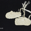 Cream silk crocheted booties, 1929, 