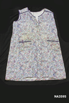 Circa 1950 floral cotton button through coverall. 
