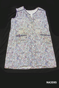 Circa 1950 floral cotton button through coverall. 