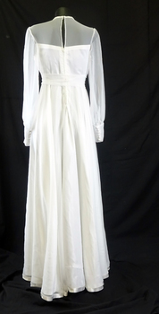 White chiffon 1978 round neck line dress with high waist, long sleeves; with cuff and six covered buttons.(back))