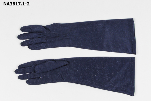 Navy blue elbow length gloves hand stitched, with three darts on top side.