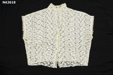 White machine made guipure lace blouse. 
