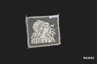 Small cream crochet sample. 
