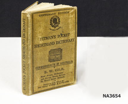 Small brown book entitled Pitman's Pocket Shorthand Dictionary