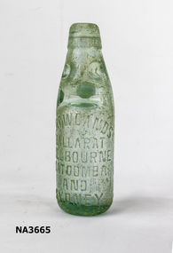 Glass bottle -with glass marble in neck of bottle. 