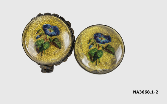 Two round horse medallions.