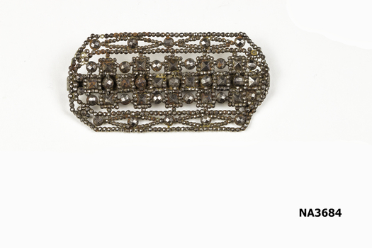 Oblong shaped brooch with anthracite or hematite stones (black). Back pin is not original
