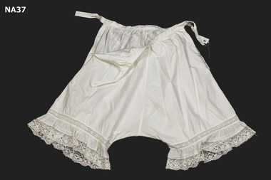 White cotton pantaloons with opening down sides