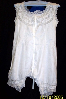 A scoop neck sleeveless combinations with short legs.