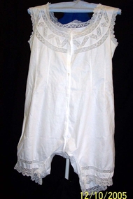 A scoop neck sleeveless combinations with short legs.