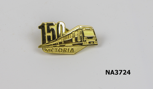 Gold pin badge with 