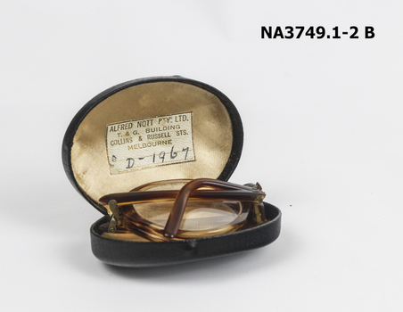 Horn rimmed spectacles
