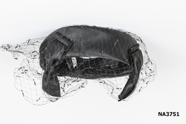 Black satin 4.5cm fascinator (cocktail hat) shaped as a crown less hat, 