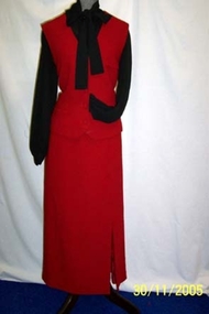 1980's black polyester blouse with yoke and tie neckline.