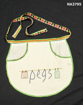 Cream calico waist apron. 