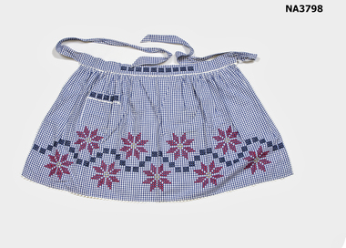 Blue and white check, trimmed around hem, sides, waistband and pocket. 