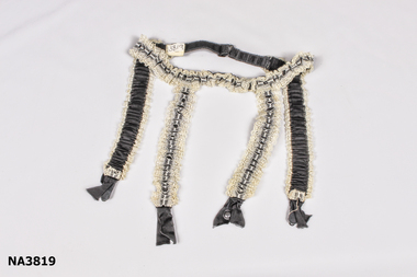 Black 3cm elastic waist band overlaid with ecru lace. 