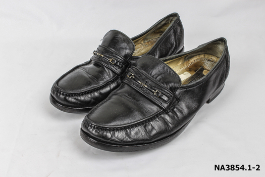 Black leather slip on shoes