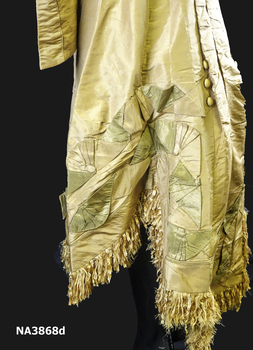 One piece old gold Paper Taffeta wedding gown, stand up collar, piped in green taffeta. 