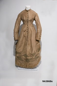 One piece old gold Paper Taffeta wedding gown, stand up collar, piped in green taffeta.  