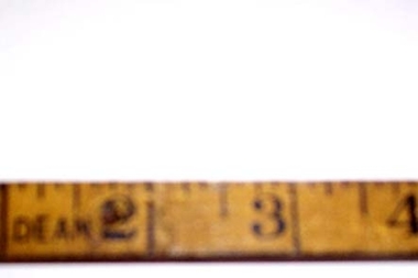 36 inch long rule with inch, half inch and quarter inch markings.