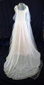 Cream lace dress and train overlaying pink satin with attached cream taffeta half slip and cream veil