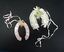 Cream net horseshoe with apple blossom  and pink rayon horse shoe