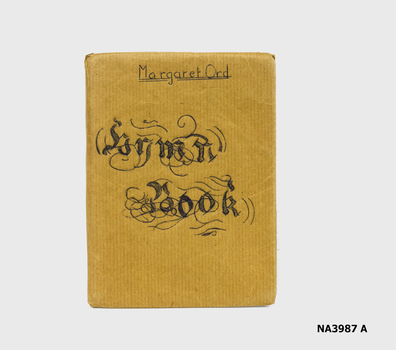 Brown paper covered church hymnal book.