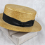 Man's Straw Hat Boater Style has a black band.