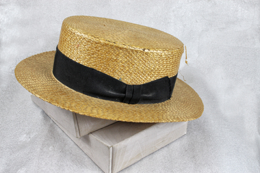 Man's Straw Hat Boater Style has a black band.